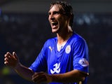 Leicester defender Ignasi Miquel celebrates a goal by Danny Drinkwater against Derby on September 24, 2013