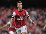 Arsenal's Jack Wilshere celebrates after scoring against Norwich during the English Premier League football match on October 19, 2013