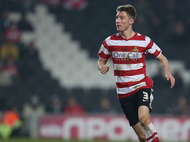 James Husband of Doncaster Rovers in action during the npower League One match between MK Dons and Doncaster Rovers at Stadium MK on March 5, 2013