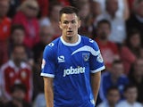 Jed Wallace of Portsmouth attacks during the Capital One Cup First Round match between AFC Bournemouth and Portsmouth at The Goldsands Stadium on August 06, 2013