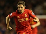 Joe Allen of Liverpool in action during the Capital One Cup Fourth Round match between Liverpool and Swansea City at Anfield on October 31, 2012 