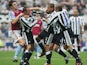 Newcastle United teammates Kieron Dyer and Lee Bowyer fight on the pitch in April 2005.