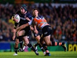 Thomas Waldrom of Tigers in action with Alberto Sgarbi of Treviso during the Heineken Cup match between Leicester Tigers and Benetton Treviso at Welford Road on October 18, 2013