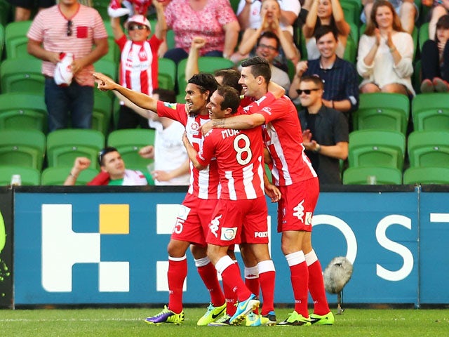 The Heart celebrate a goal by David Williams during the round two A-League match between Melbourne Heart and the Central Coast Mariners at AAMI Park on October 19, 2013