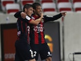 Nice's Argentinian forward Dario Cvitanich and Nice's French forward Jeremy Pied celebrates after scoring a goal during the French L1 football match Nice (OGC Nice) vs Marseille (OM) on October 18, 2013