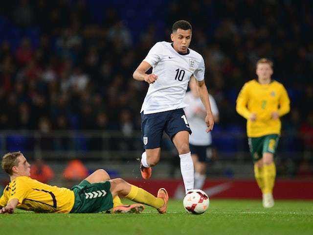 Ravel Morrison of England Under-21s drives with the ball against Lithuania at Portman Road on October 15, 2013