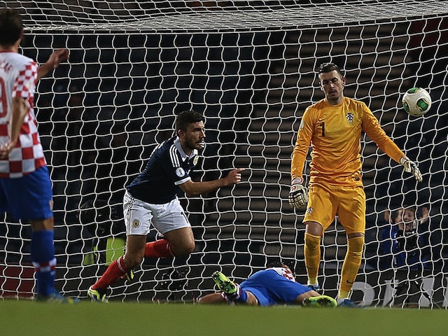 Robert Snodgrass of Scotland scores a goal during the World Cup 2014 qualifying football match between Scotland and Croatia at Hampden Park in Glasgow on October 15, 2013