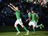 Saint-Etienne's French midfielder Benjamin Corgnet celebrates with his teammates after scoring a goal during the French L1 football match AS Saint-Etienne (ASSE) vs Lorient (FCL) on October 20, 2013