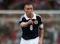 Scott Brown of Scotland gestures during the International Friendly match between England and Scotland at Wembley Stadium on August 14, 2013