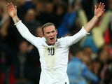 England's Wayne Rooney celebrates scoring against Poland on October 15, 2013