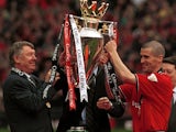Alex Ferguson and Roy Keane lift the Premier League trophy aloft in May 2001.