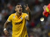 Juventus' Chilean midfielder Arturo Erasmo Pardo Vidal argues with German referee Manuel Grafe during the UEFA Champions League Group B football match against Real Madrid on October 23, 2013