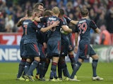 Several Bayern Munich players celebrate after the fourth goal during the UEFA Champions League group D match against Plzen on October 23, 2013