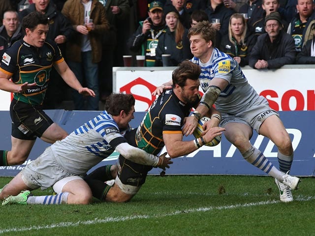 Northampton's Ben Foden dives across to score a try against Saracens on October 26, 2013