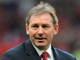 Former Manchester United and England national team's captain Bryan Robson is presented to the crowd before a English Premier League football match on August 22, 2011