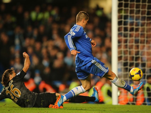 Fernando Torres of Chelsea scores their second goal during the Barclays Premier League match between Chelsea and Manchester City at Stamford Bridge on October 27, 2013