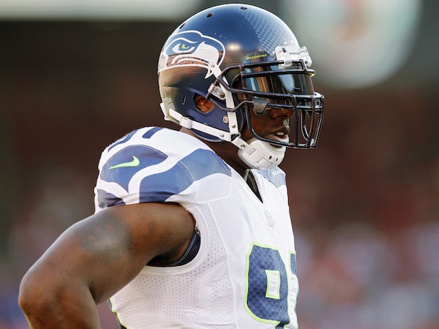 Defensive Chris Clemons of the Seattle Seahawks warms up before a game against the San Francisco 49ers on October 18, 2012