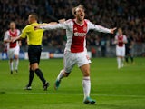 Christian Eriksen (#8) of Ajax celebrates after he shoots and scores his teams third goal of the game during the Group D UEFA Champions League match between AFC Ajax and Manchester City FC at Amsterdam ArenA on October 24, 2012