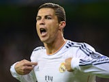 Real Madrid's Portuguese forward Cristiano Ronaldo celebrates after scoring during the UEFA Champions League Group B football match Real Madrid CF vs Juventus on October 23, 2013