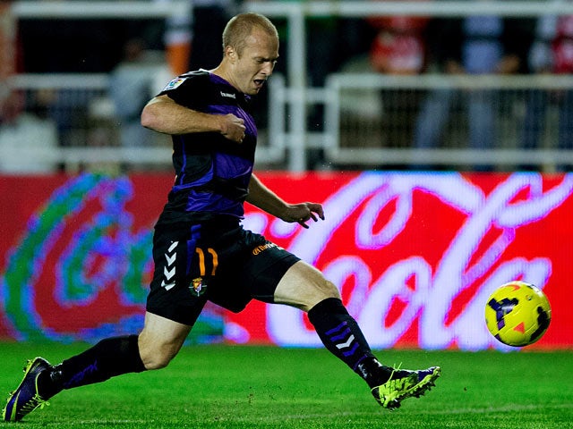 Real Valladolid's Daniel Larsson scores his team's second goal against Rayo Vallecano on October 25, 2013