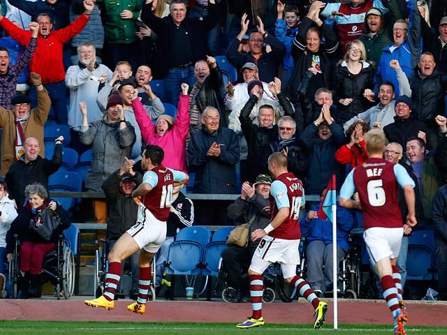 Burnley's Danny Ings celebrates after scoring the opening goal against QPR on October 26, 2013
