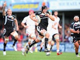 Exeter Chiefs' Dean Mumm run clear to score a try against Worcester Warriors on October 26, 2013