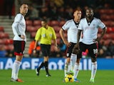 Dimitar Berbatov and Darren Bent of Fulham look on during the Barclays Premier League match between Southampton and Fulham at St Mary's Stadium on October 26, 2013