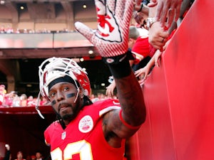Wide receiver Dwayne Bowe #82 of the Kansas City Chiefs high-fives fans prior to the game against the Houston Texans at Arrowhead Stadium on October 20, 2013