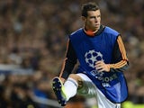 Real Madrid's Welsh striker Gareth Bale warms up during the UEFA Champions League Group B football match versus Juventus at the Santiago Bernabeu stadium in Madrid on October 23, 2013