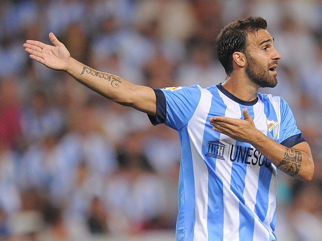 Malaga's Jesus Gamez in action against Barcelona on August 25, 2013
