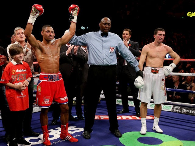 Kell Brook celebrates his victory over Vyacheslav Senchenko during their Final Eliminator for the IBF World Welterweight Championship bout at Motorpoint Arena on October 26, 2013