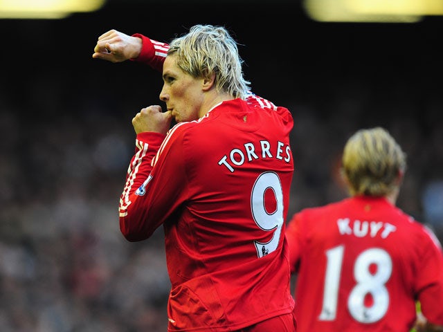 Fernando Torres of Liverpool celebrates scoring the opening goal during the Barclays Premier League match between Liverpool and Manchester United at Anfield on October 25, 2009