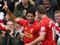 Luis Suarez of Liverpool celebrates completing his hat-trick during the Barclays Premier League match against West Brom on October 26, 2013
