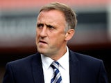 Cheltenham manager Mark Yates looks on prior to the Sky Bet League Two match between Cheltenham Town and AFC Wimbledon at The Abbey Business Stadium on September 28, 2013