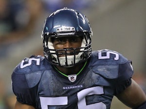 Linebacker Mike Morgan of the Seattle Seahawks defends against the Oakland Raiders at CenturyLink Field on September 2, 2011
