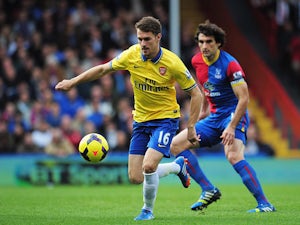 Wenger urges 'caution' over Ramsey