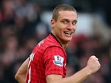 Nemanja Vidic of Manchester United celebrates scoring the second goal during the Barclays Premier League match against Liverpool on January 13, 2013