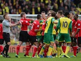 Tempers flare between the two sides during the Barclays Premier League match between Norwich City and Cardiff City at Carrow Road on October 26, 2013 