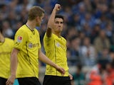 Dortmund's Nuri Sahin celebrates after scoring his team's second goal against Schalke on October 26, 2013