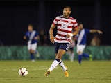 Oguchi Onyewu of the USA passes the ball against Guatemala at Qualcomm Stadium on July 5, 2013 in San Diego, California