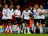 Fulham's Pajtim Kasami is congratulated by team mates after scoring the equaliser against Crystal Palace on October 21, 2013
