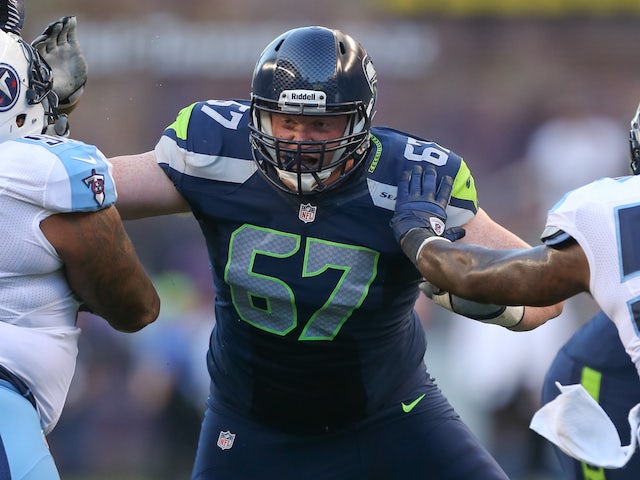 Paul McQuistan of the Seattle Seahawks blocks against the Tennessee Titans at CenturyLink Field on August 11, 2012 