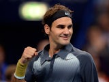 Roger Federer celebrates his win against Grigor Dimitrov during their Swiss Indoors quarter-final tennis match on October 25, 2013