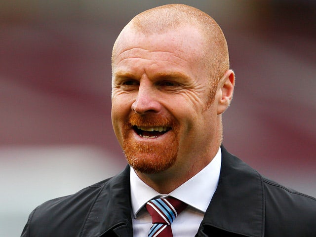 Burnley manager Sean Dyche smiles during his team's match against QPR on October 26, 2013