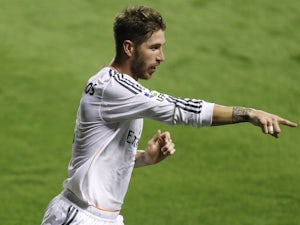 Madrid hold slender interval lead