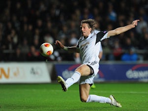 Swansea held after last-minute penalty