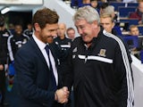 Manager Andre Villas Boas of Spurs shakes hands with Manager Steve Bruce of Hull City during the Barclays Premier League match between Tottenham Hotspur and Hull City at White Hart Lane on October 27, 2013