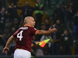 AS Roma's US midfielder Michael Bradley celebrates after scoring during the Serie A football match Udinese vs AS Roma at 'Stadio Friuli' in Udine on October 27, 2013