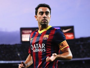 Xavi returns to Barca squad