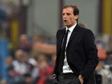AC Milan head coach Massimiliano Allegri reacts during the Serie A match between AC Milan and ACF Fiorentina at Stadio Giuseppe Meazza on November 2, 2013
